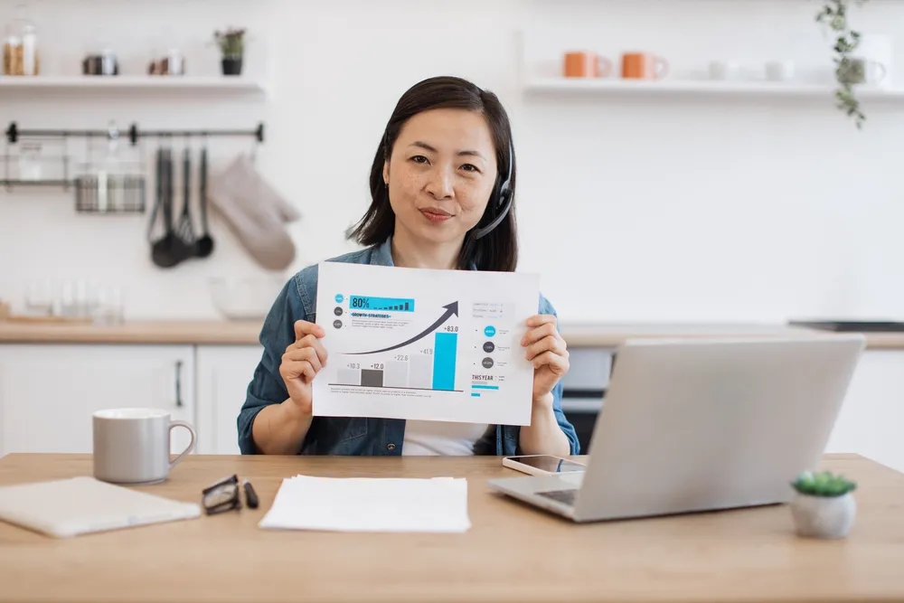 professional-showing-graphs-on-online-presentation-2024-12-12-04-38-21-utc